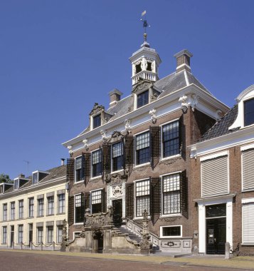 The facade of the old cityhall of Sneek, Friesland, Holland clipart