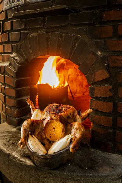 Wood-fired oven roasted chicken with citrus.
