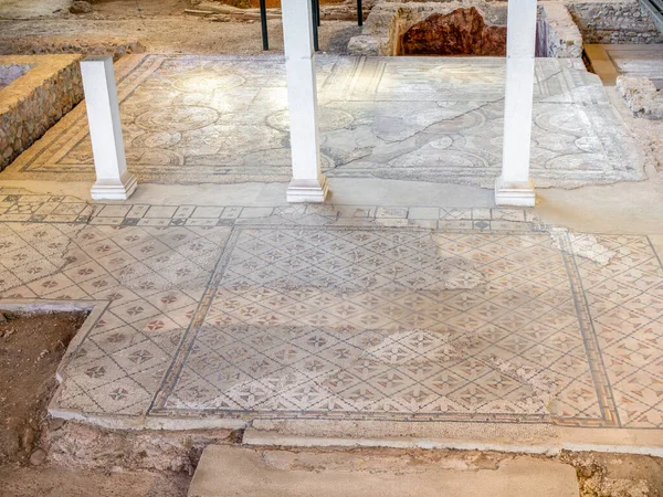 stock image Mosaic composed of a series of geometric motifs in the House of Hippolytus, one of the most important remains within the archaeological site of Complutum, a Roman City located in Alcala de Henares, Madrid, Spain