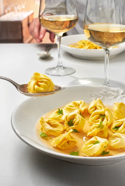 Tortellini in brodo, typical dish from the culinary tradition of northern regions of Italy