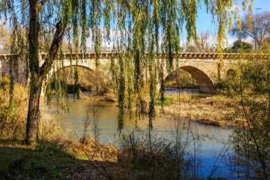 The Arab Bridge, highlighting its Andalusi and Castilian architectural structure. Castilla la Mancha, Guadalajara, Spain. clipart