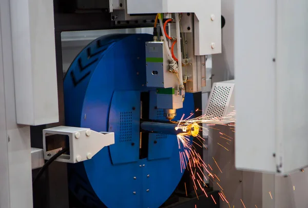 Pipe laser cutting machine. Industrial manufacture.