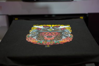 Sublimation printer printing T shirt show in Garment and Textile Manufacturing Industry.	