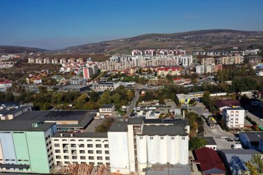 Aerial view of industrial zone and technology park buildings by drone clipart