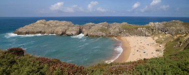 Santander, Spain - August 20, 2022: Somocuevas Western Beach in Liencres, Cantabria, Spain. clipart