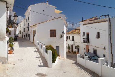 Fork between Whitewashed Houses in Altea, Alicante, Spain.