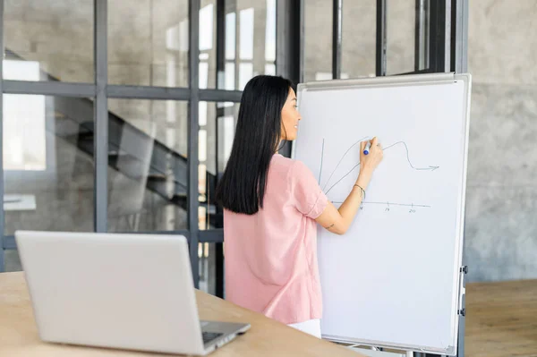 Rear View Girl Drawing Graph Diagram Interactive Whiteboard Modern Office — Stock Photo, Image