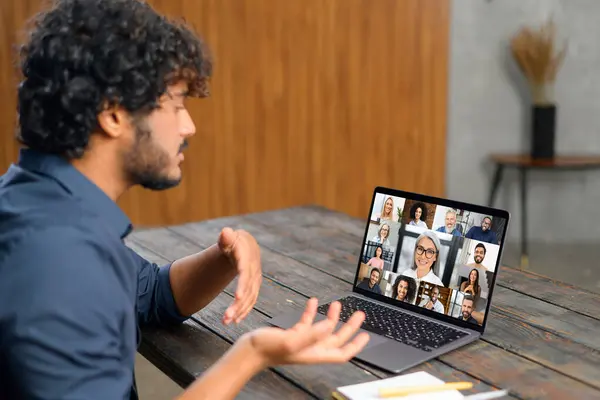 Man Gestures While Actively Participating Virtual Meeting Discussing Exchanging Ideas — Stock Photo, Image