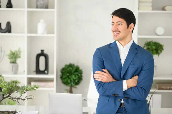 Young Businessman Smiling Standing Relaxed Pose Arms Crossed Bright Office — Stock Photo, Image