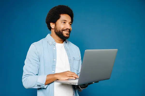 Smart Intelligent Brazilian Man Freelancer Student Using Laptop Blue Background — Stock Photo, Image