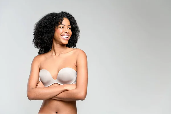 Gleeful African American Woman Strapless Top Chuckles Heartily Her Arms — Stock Photo, Image