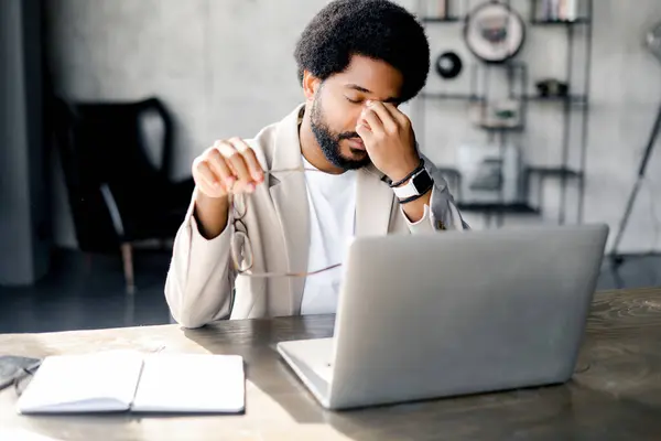 Modern Businessman Rubs Eyes Fatigue Exasperation While Working His Laptop — Stock Photo, Image