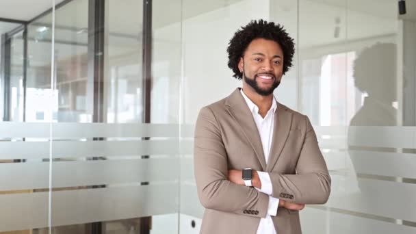 African American Businessman Stands Confidently Modern Office Environment Arms Crossed — Stock Video
