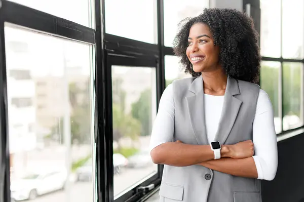 Optimistic African American Businesswoman Looks Out Window Her Thoughtful Expression Stock Photo