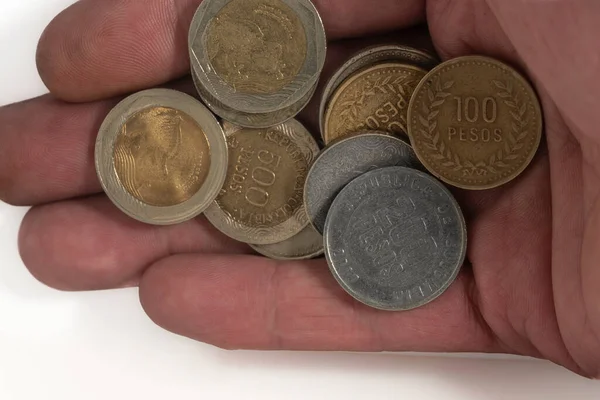 Människans Hand Med Colombianska Mynt — Stockfoto