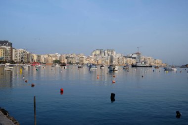 MALTA - NOVEMBER 2022: Panoramic view of La Valletta harbor with boats in Malta