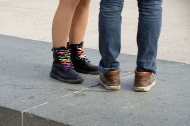 black boots with colored laces