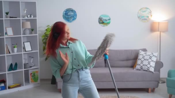 Happy Young Woman Headphones Mop Hands Has Fun Dancing Singing — Stockvideo