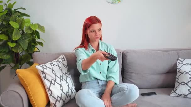 Young Woman Relaxing Home Watching Show Changing Channels Remote Control — Stok video