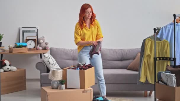 Back Home Young Woman Returns Apartment Puts Things Boxes Waves — Stockvideo