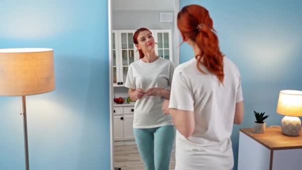 Weight Loss Joyful Young Woman Goes Mirror Measures Waist Sewing — Vídeos de Stock