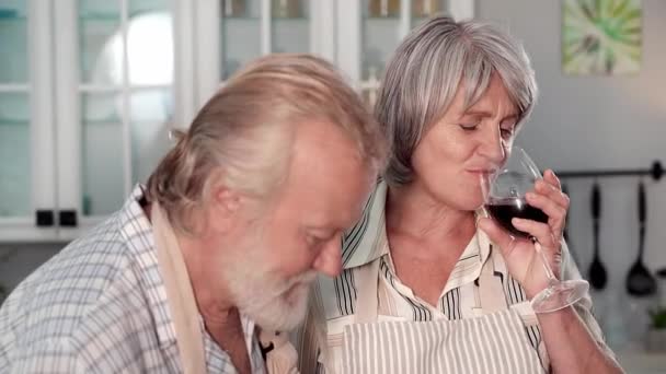 Happy Old Woman Glass Wine Having Fun Husband While Cooking — Stock Video