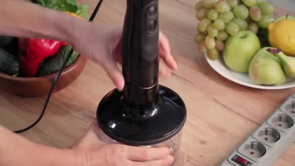 Young Housewife Collects Parts Electric Blender Grind Parts Table Close — Stock Video