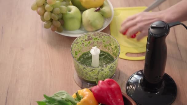 Young Woman Cuts Pepper Throws Blender Grind Make Smoothie Kitchen — Stock Video
