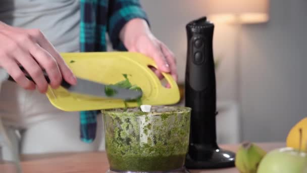 Vegetarianism Young Woman Cuts Fresh Cucumber Adding Smoothie Grinding Blender — Stock Video