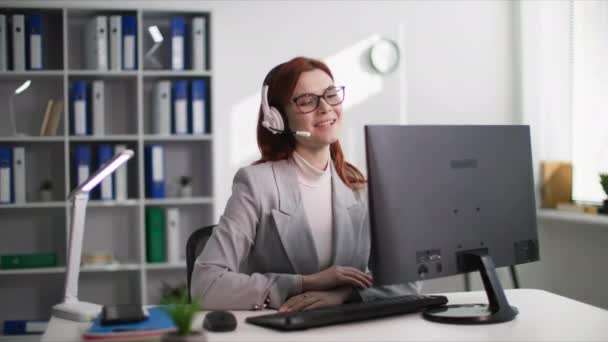 Portrait Female Call Center Operator Glasses Consulting Client Using Headset — Stock Video