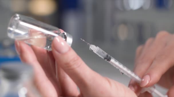 Medicine Woman Hand Syringe Needle Her Hands Draws Medicine Bottle — Stock Video
