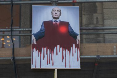 Billboard Putin Looking Like The Godfather At The Protest Against The War In Ukraine At Amsterdam The Netherlands 6-3-2022 clipart