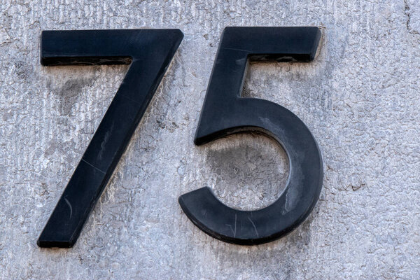 Close Up 75 House Number At Amsterdam The Netherlands 23-6-2022