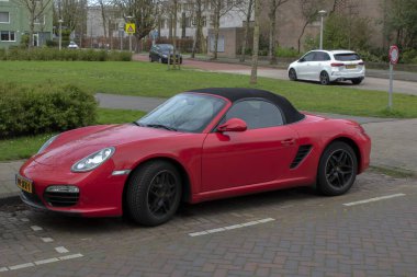 Amsterdam 'daki kırmızı Porsche Car Hollanda 6-4-2024