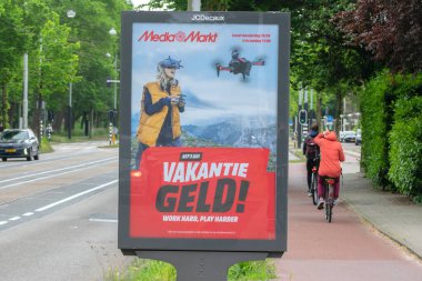 Billboard Mediamarkt Vakantiegeld Amsterdam 27-5-2023