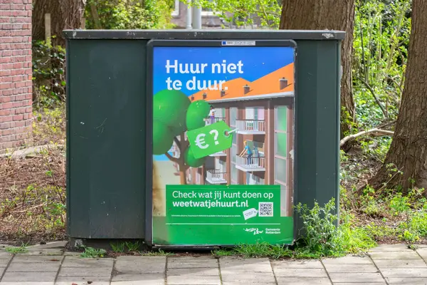 Stock image Billboard Huur Niet Te Duur At Amsterdam The Netherlands 13-4-2023