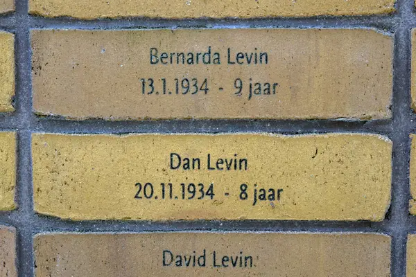 stock image Bricks From The Holocaust Name Monument For People With The Levin Family Name At Amsterdam The Netherlands 29-4-2024