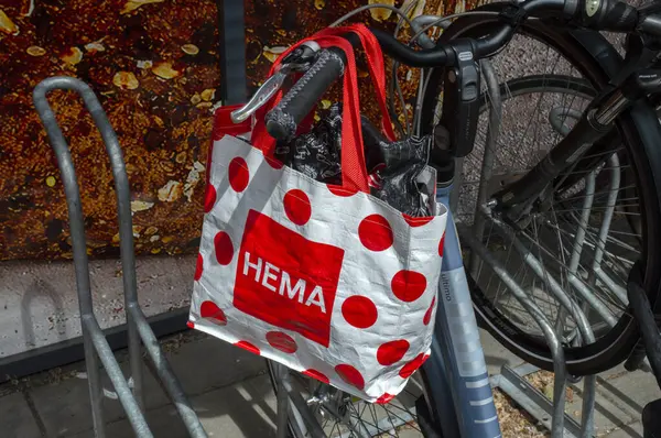 stock image Close Up Hema Bag On A Bicycle At Amsterdam The Netherlands 12-6-2024