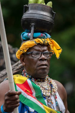 Close Up Man In Traditional Clothes At The Keti Koti Festival At Amsterdam The Netherlands 1-7-2022 clipart