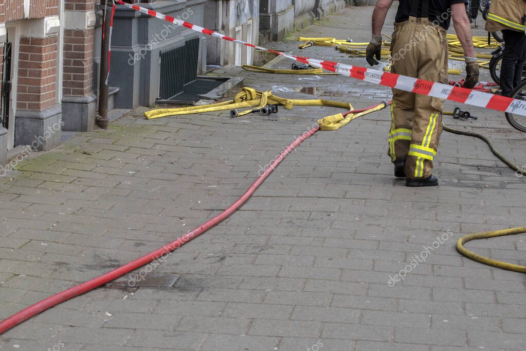 Fire Department Working Behind Ducktape At Amsterdam The Netherlands 27-4-2023