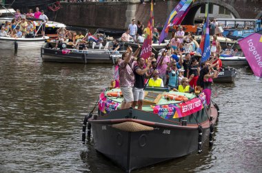 Bestuur And Friends Boats At Gaypride Canal Boat Parade At Amsterdam The Netherlands 3-8-2024 clipart