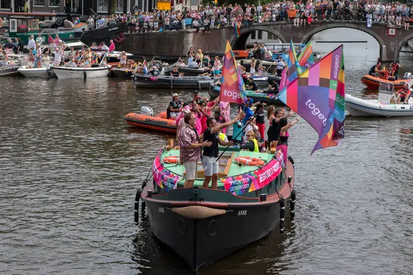 stock image Bestuur And Friends Boats At Gaypride Canal Boat Parade At Amsterdam The Netherlands 3-8-2024