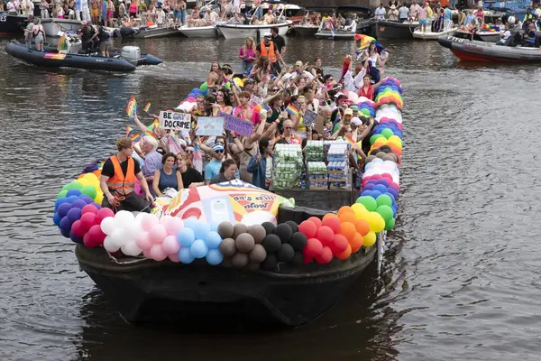 stock image Pride University At Gaypride Canal Boat Parade At Amsterdam The Netherlands 3-8-2024