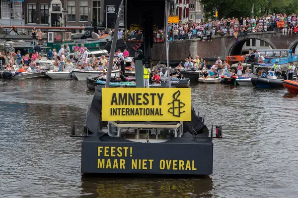 stock image Amnesty International Boat Gaypride Empty Canal Boat Parade At Amsterdam The Netherlands 3-8-2024