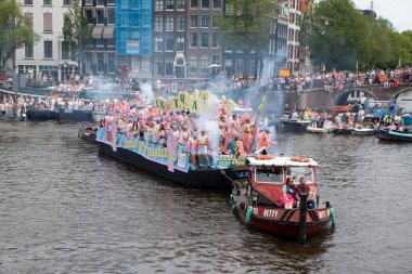 Gay Expats Amsterdam At Gaypride Canal Boat Parade At Amsterdam The Netherlands 3-8-2024 clipart