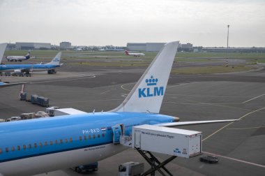 Delivering Catering At The Backside Of A KLM Airplane At Schiphol The Netherlands 29--2024 clipart