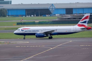 A British Airways Embraer E190SR Plane At Schiphol Airport The Netherlands 29-8-2024 clipart