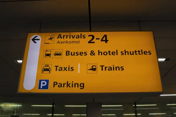 stock image Direction Sign Before The Gates At Schiphol Airport The Netherlands 29-8-2024