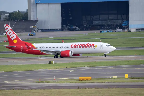 stock image Looking From The Side Of A Corendon Plane At Schiphol Airport The Netherlands 29-8-2024