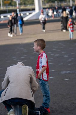 Father And Son Are Ajax Fans At Amsterdam The Netherlands 27-10-2024 clipart